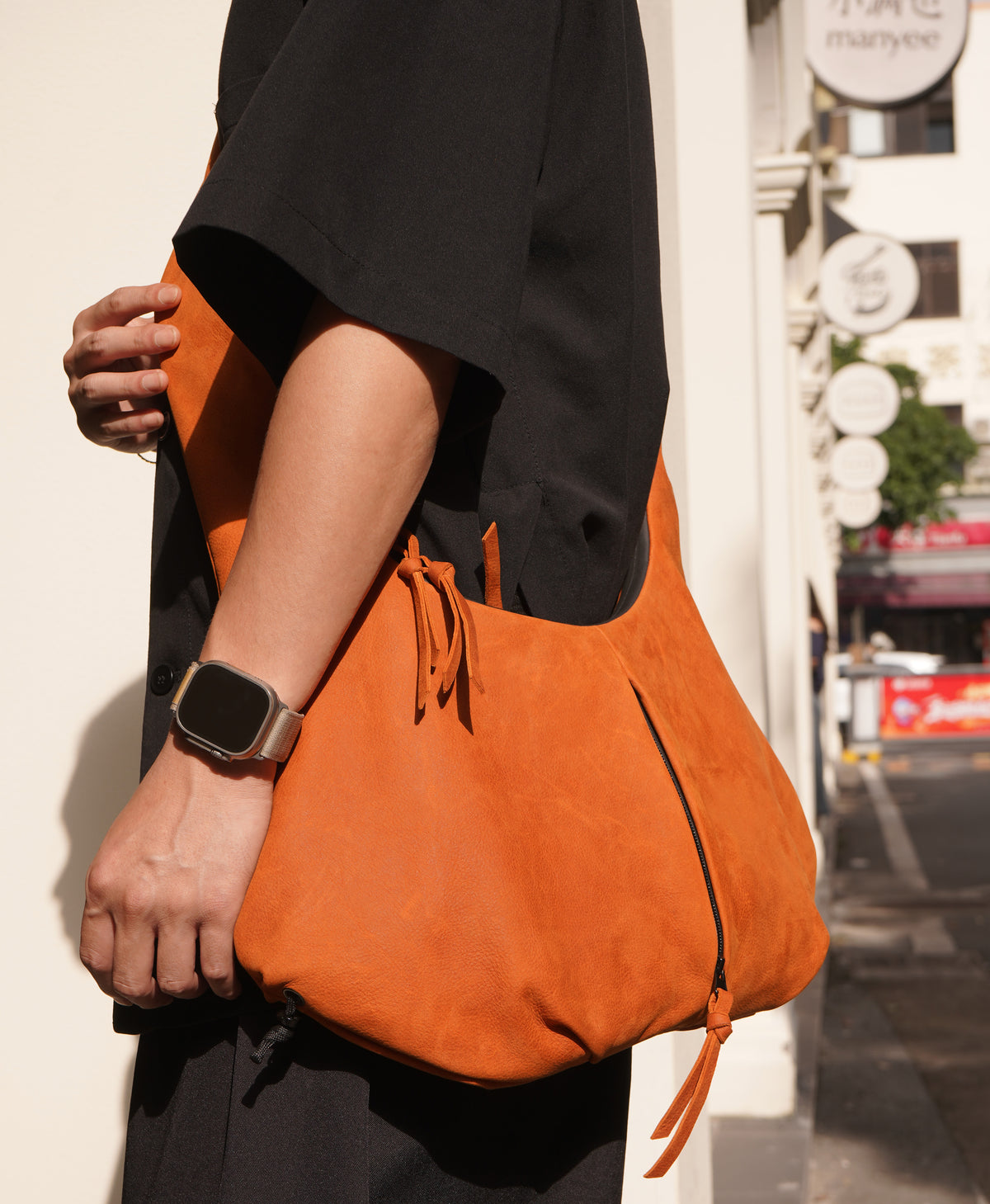 Oversized oransje kuskinns veske