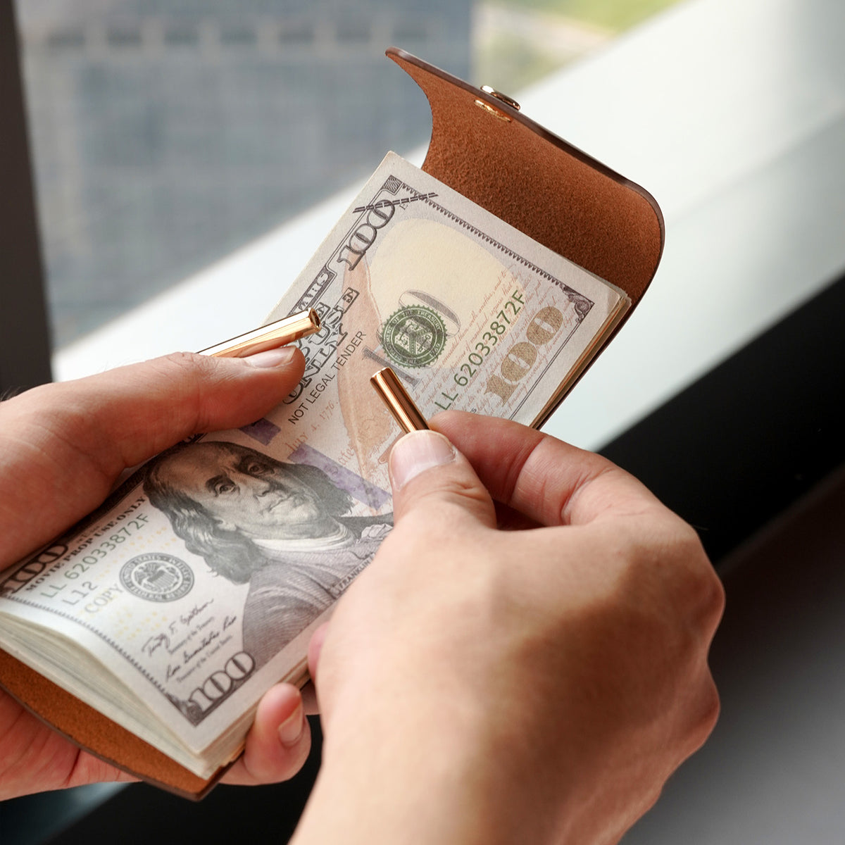 Brązowy portfel na banknoty ze skóry licowej