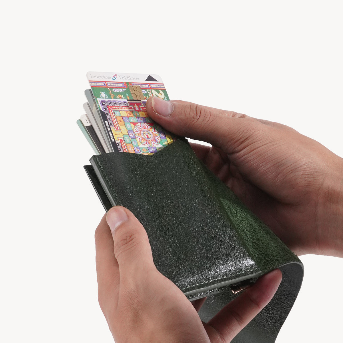 Handgefertigtes, dreifach faltbares Münzportemonnaie aus pflanzlich gegerbtem Leder