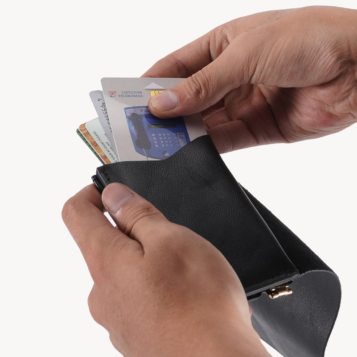 Handgefertigtes, dreifach faltbares Münzportemonnaie aus pflanzlich gegerbtem Leder