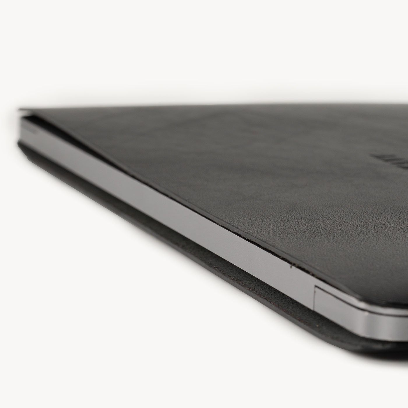 Black full grain leather sleeve detail view 7
