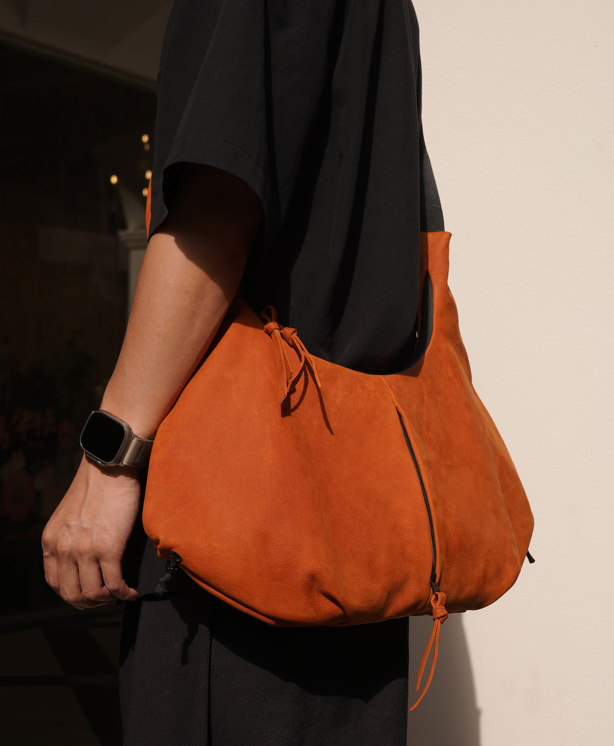 Oversized oransje kuskinns veske