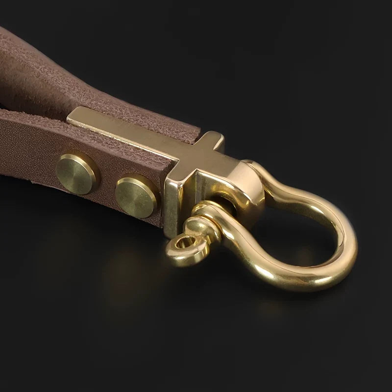Brass horseshoe shackle keychain leather detail