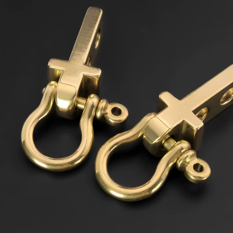 Leather loop and polished brass keychain hardware detail