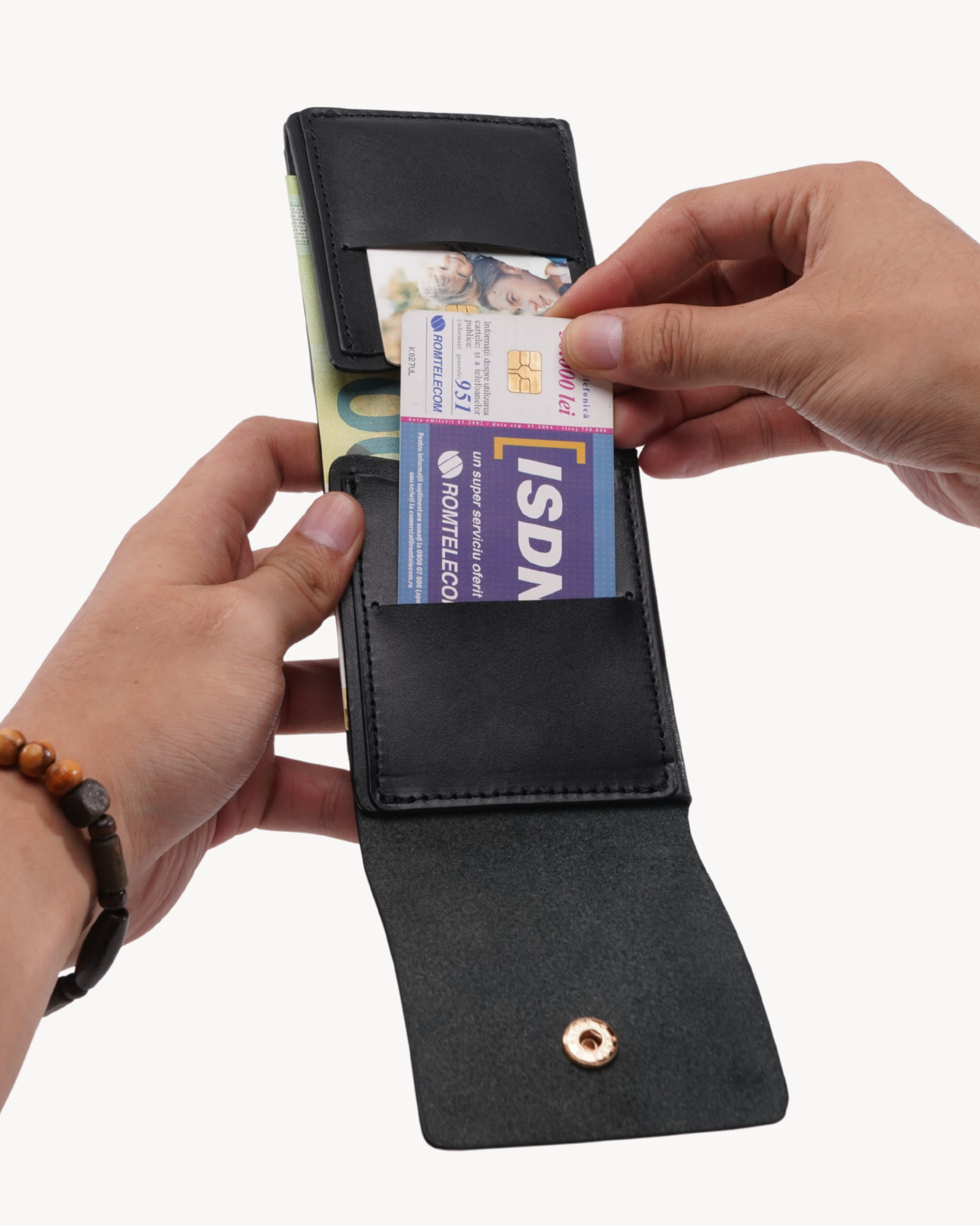 Handmade Full-Grain Saddle Leather Vertical Snap Wallet - interior card access in hand