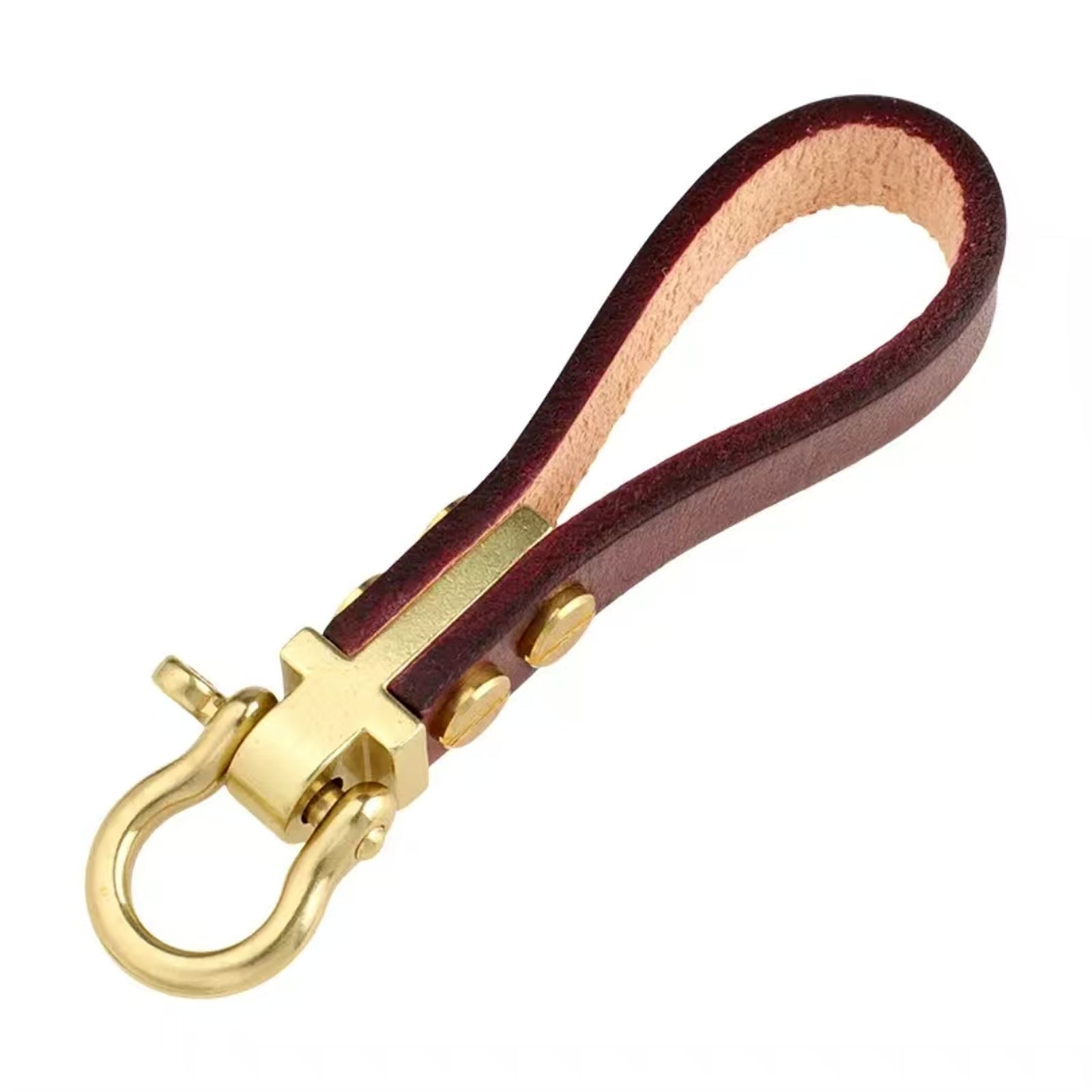 Brown leather and brass horseshoe shackle keychain on white background