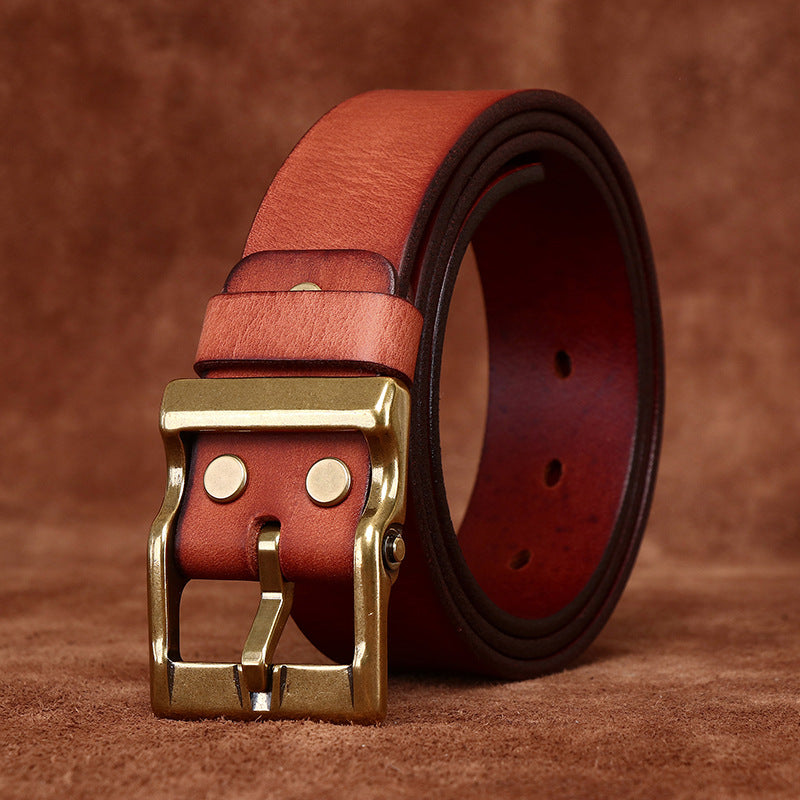 Red brown leather belt showing buckle attachment and leather keeper