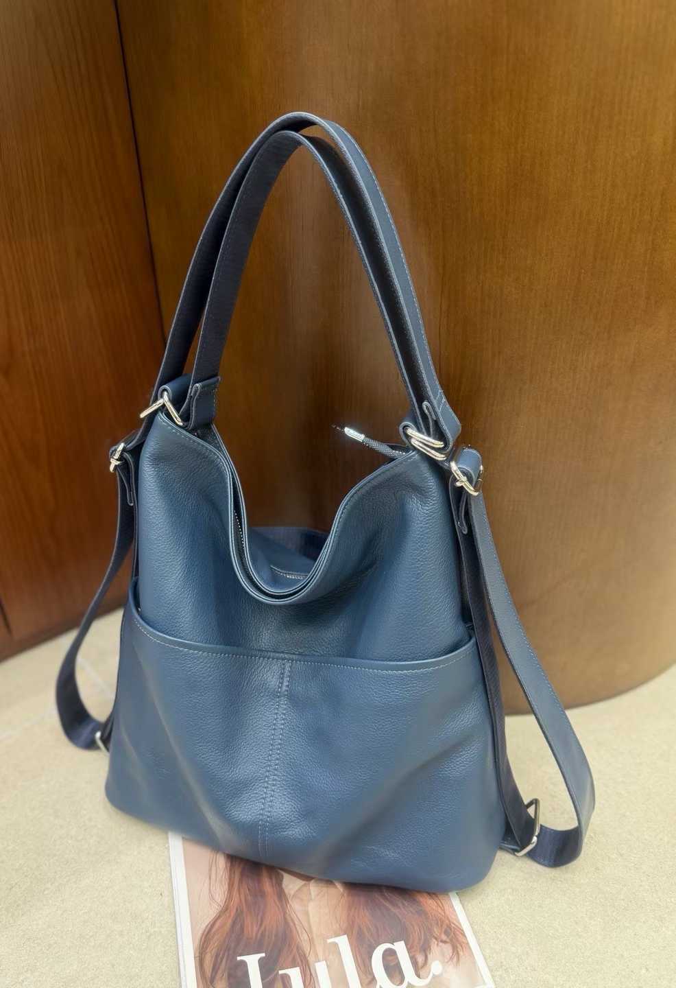 Blue convertible leather tote backpack product view