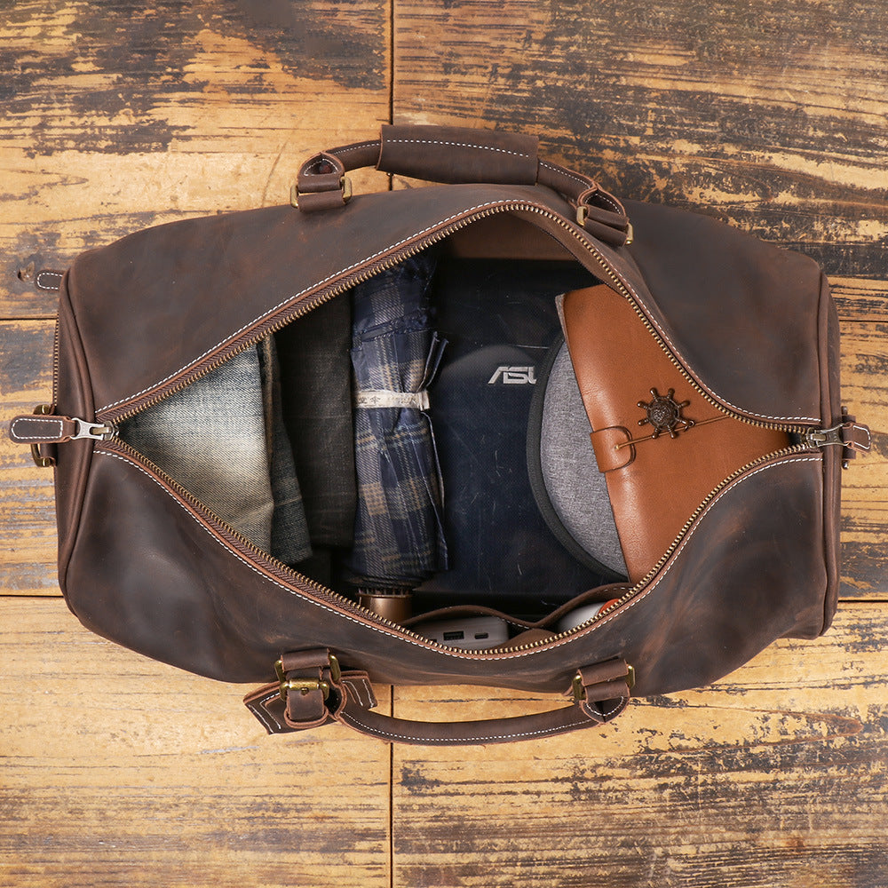 Packed main compartment with clothing and travel essentials