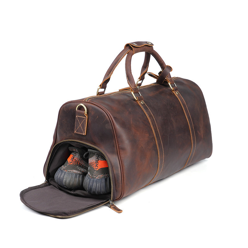 Separate end shoe compartment on the leather travel duffle bag