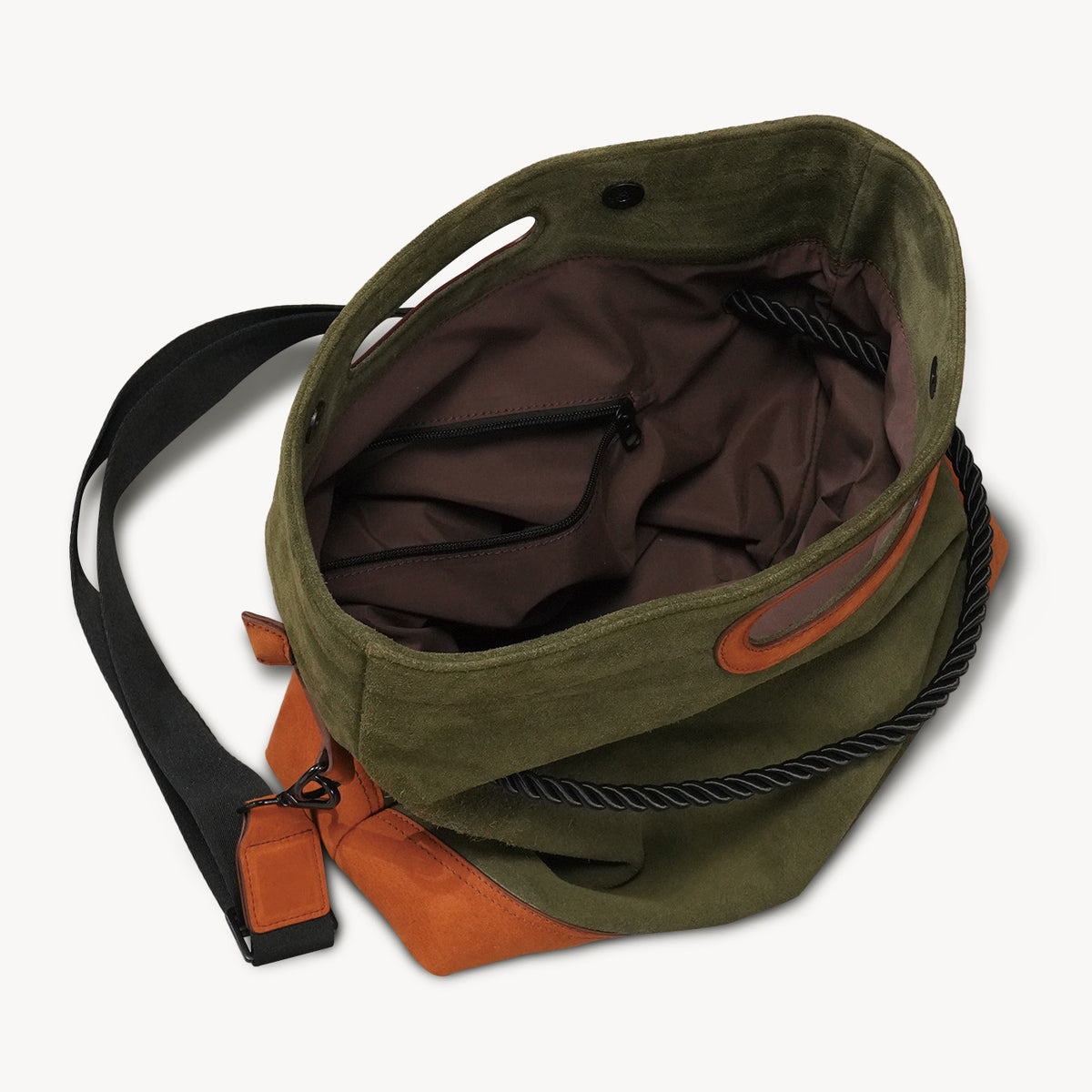 Open KAKAVY TRIO bag showing the lined interior and zip pocket