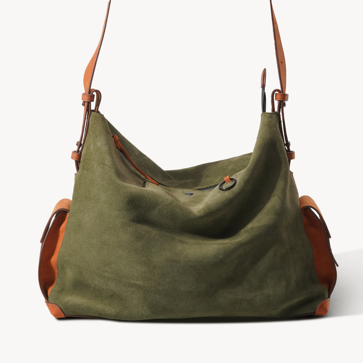 Rear view of the KAKAVY Roam bag with long leather shoulder strap