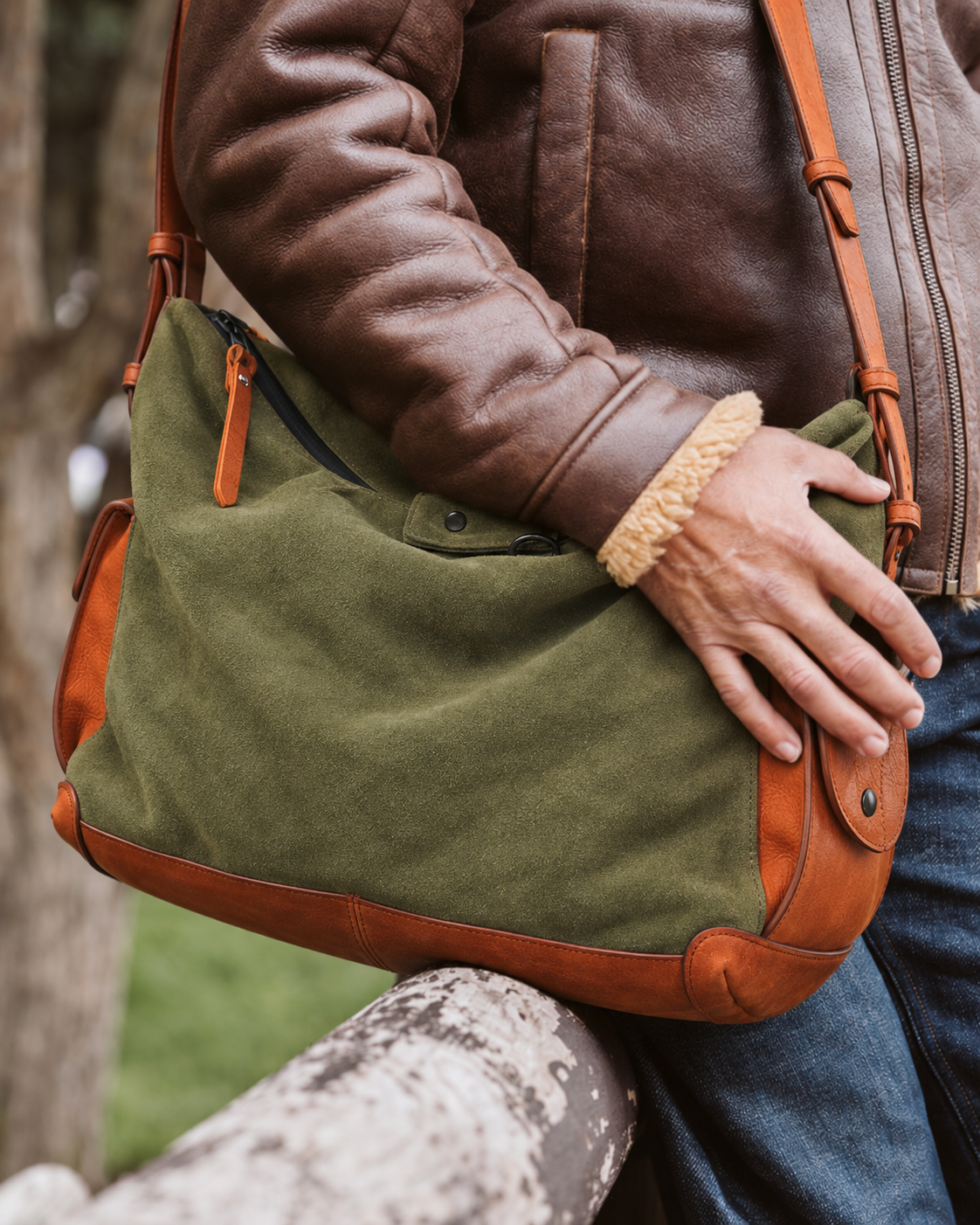 KAKAVY Roam suede and leather shoulder bag in everyday use