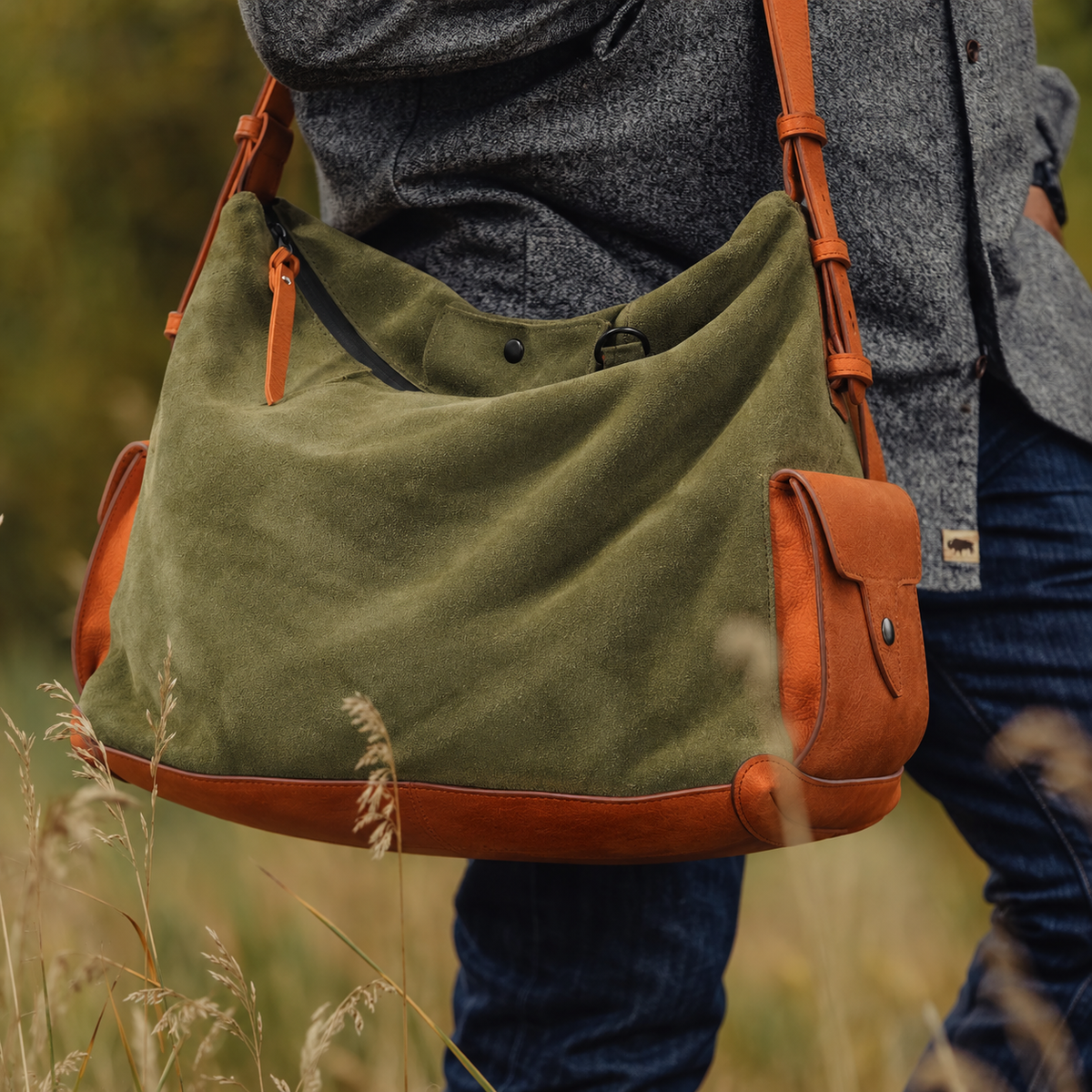 KAKAVY Roam suede and leather shoulder bag in everyday use