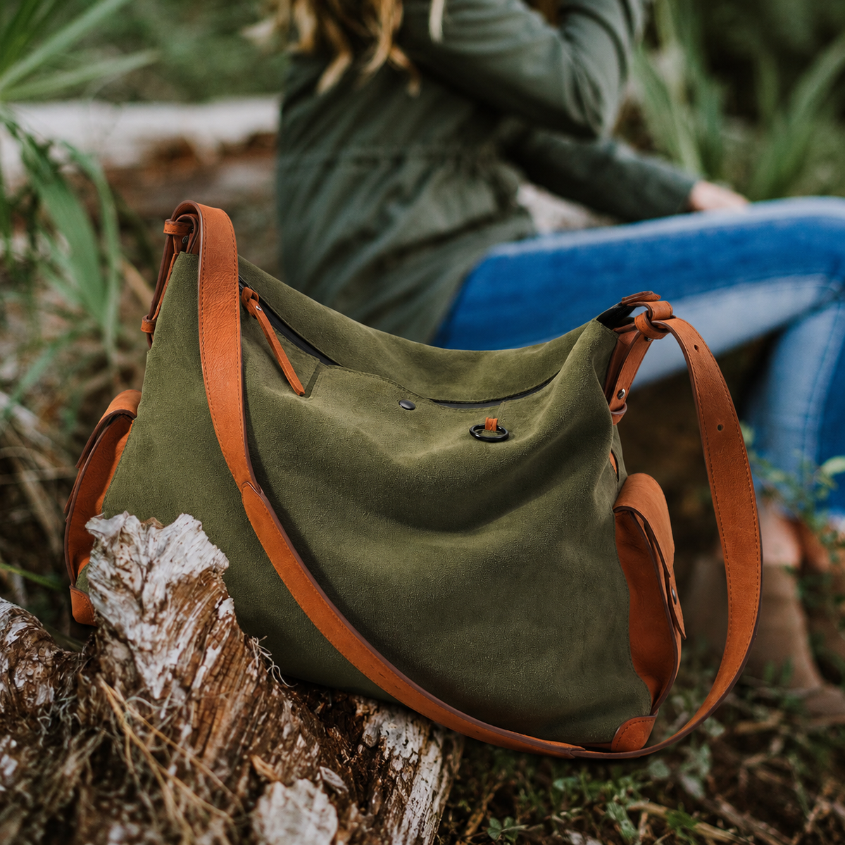 KAKAVY Roam suede and leather shoulder bag in everyday use